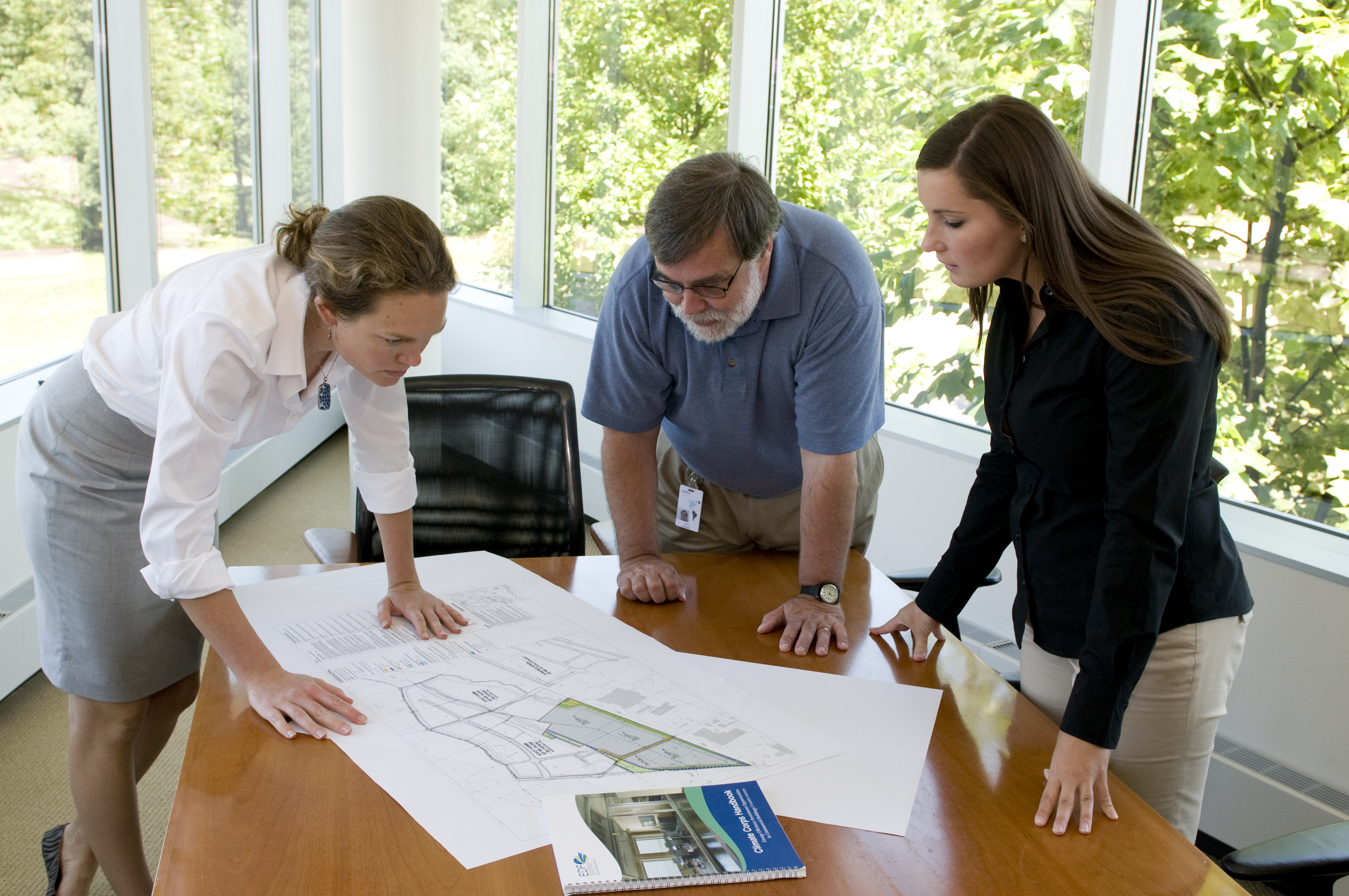 Elizabeth Henry (left) and adidas's head of real estate Doug Noonan, along with adidas's 2011 fellow Paulina Orkisz.